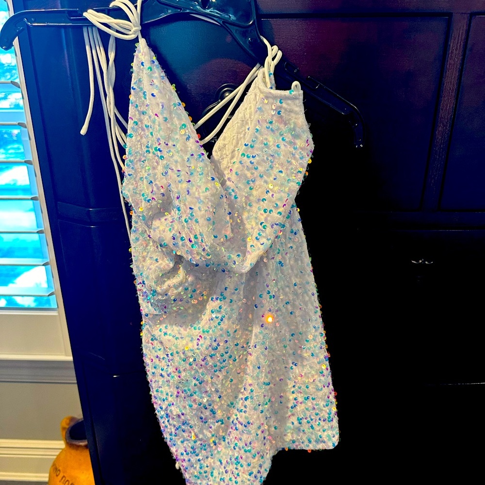 Women’s white mini dress with blue silver and purple sequence